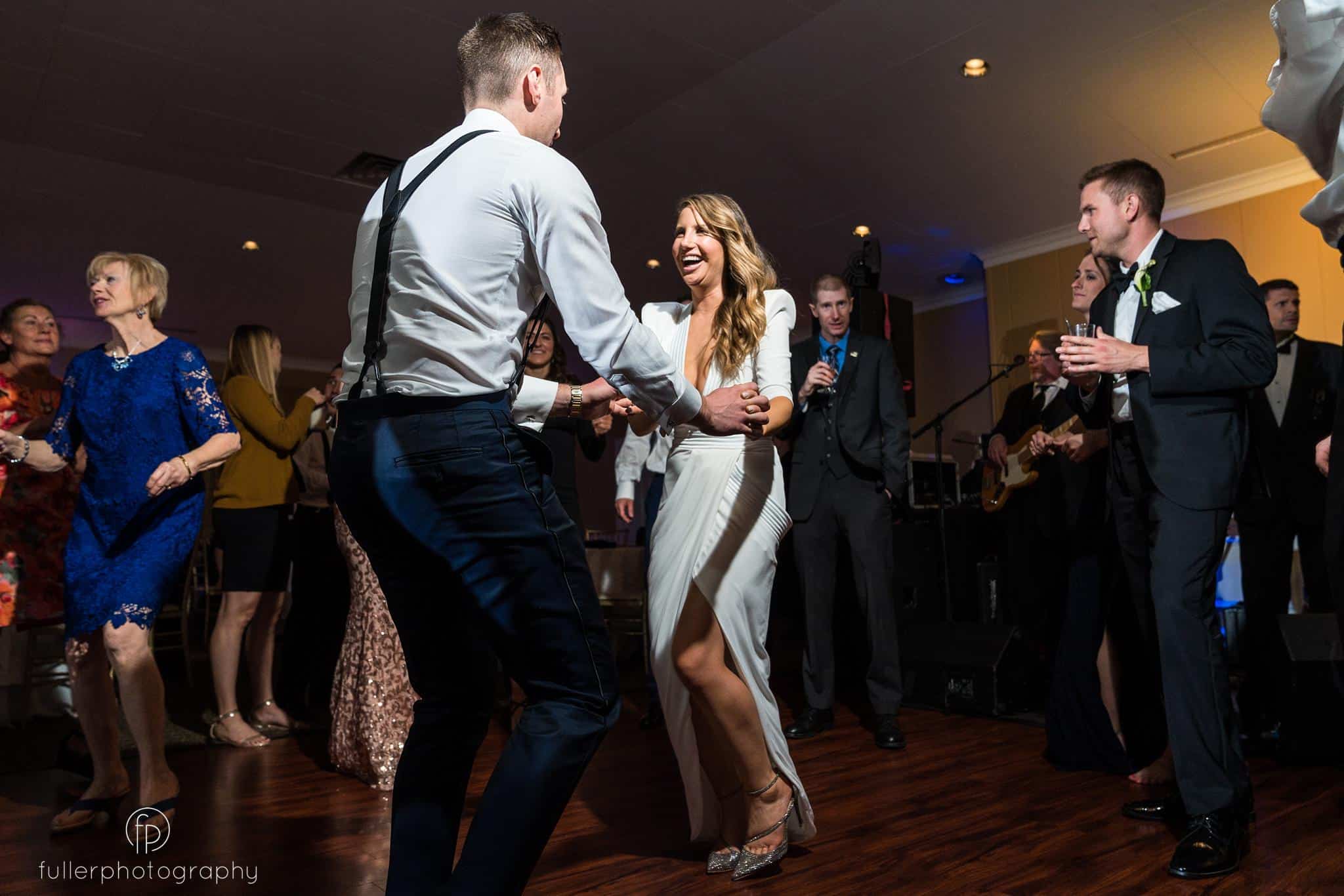 Bride and groom dancing during their reception