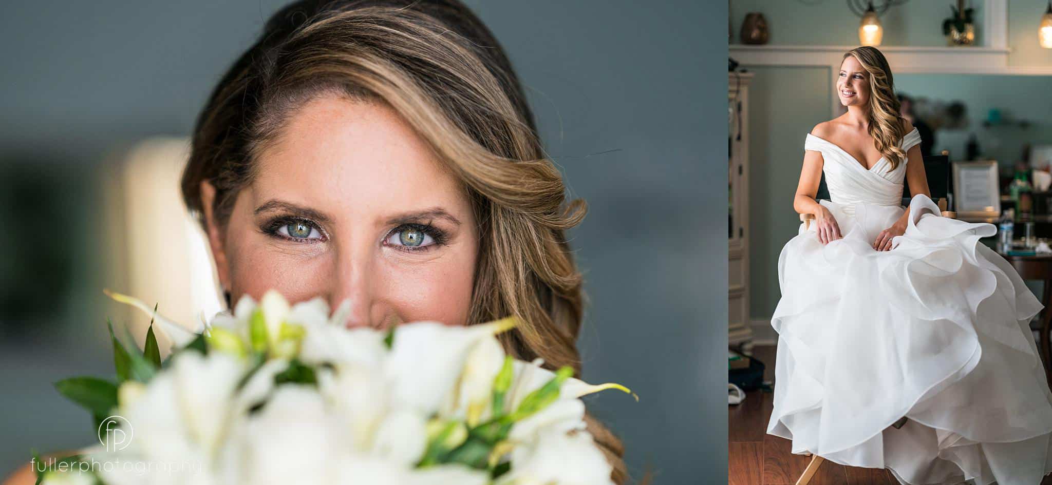 Bride looking at camera over flowers in bridal suite