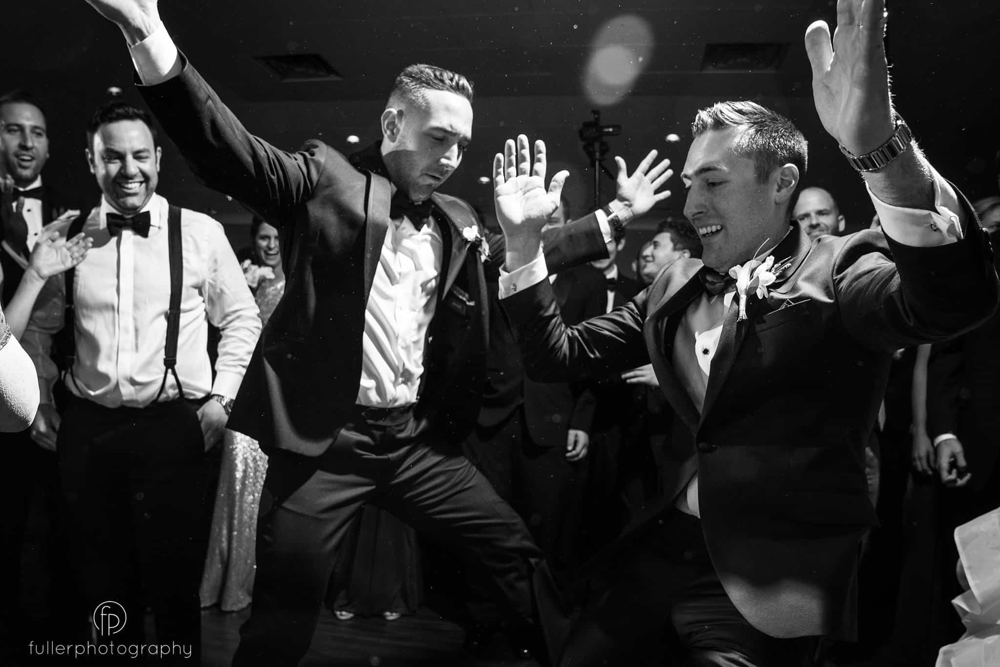 Groom dancing on the dance floor at Penn Oaks