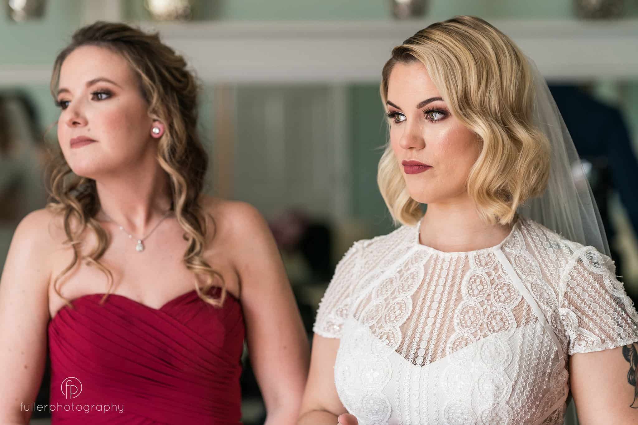 bride crying while listening to her bridesmaid's speech.