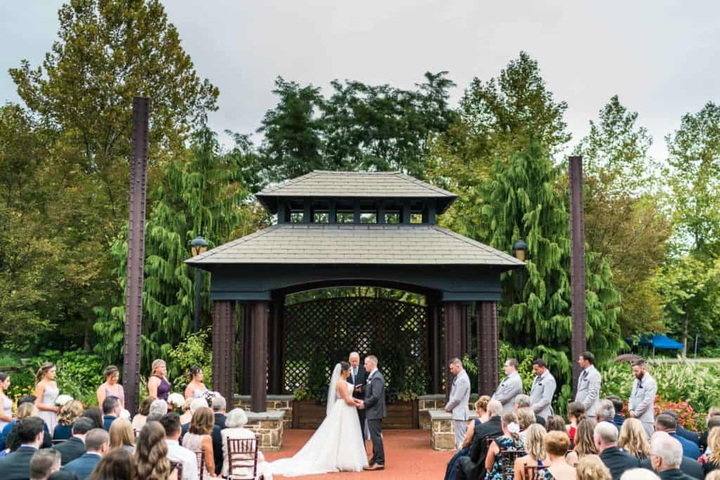 Outdoor ceremony at the sculpture garden of Phoenixville Foundry